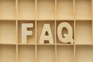 Wooden letters spelling FAQ