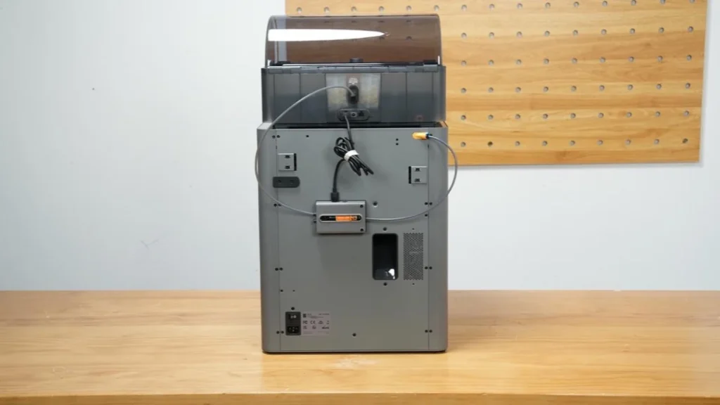 Rear view of a P2S with an AMS 2 Pro on top, showing the tubes and cable connections.